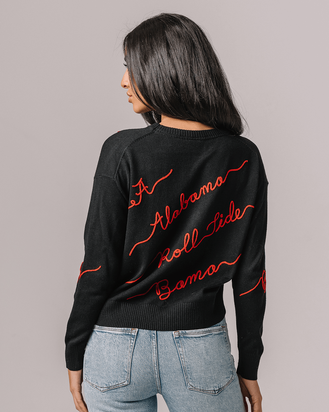 Black crewneck sweater with Alabama Crimson Tide embroidery perfect for spirited game day looks