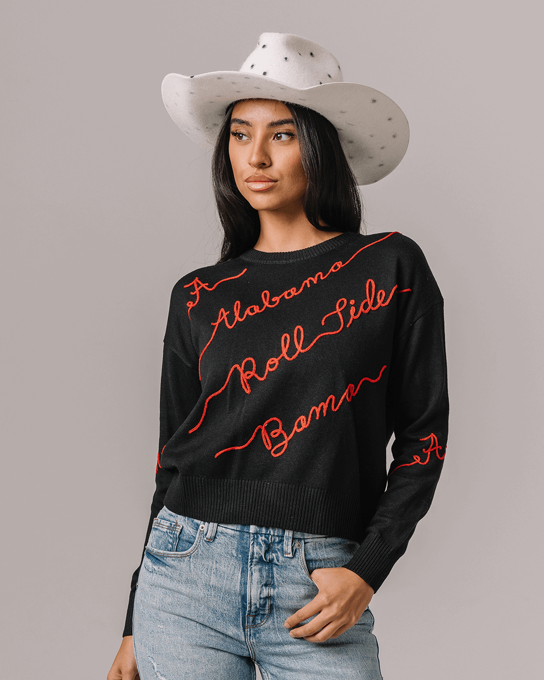 Black crewneck sweater with Alabama Crimson Tide embroidery perfect for spirited game day looks