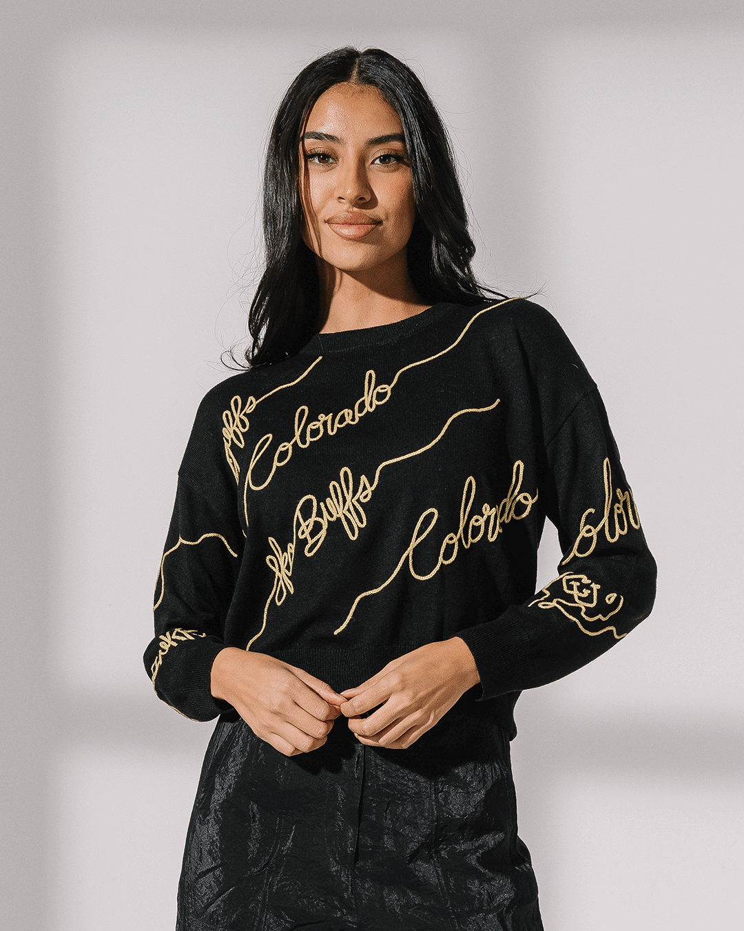 black long sleeve sweater with colorado buffaloes embroidery, perfect for college campus wear