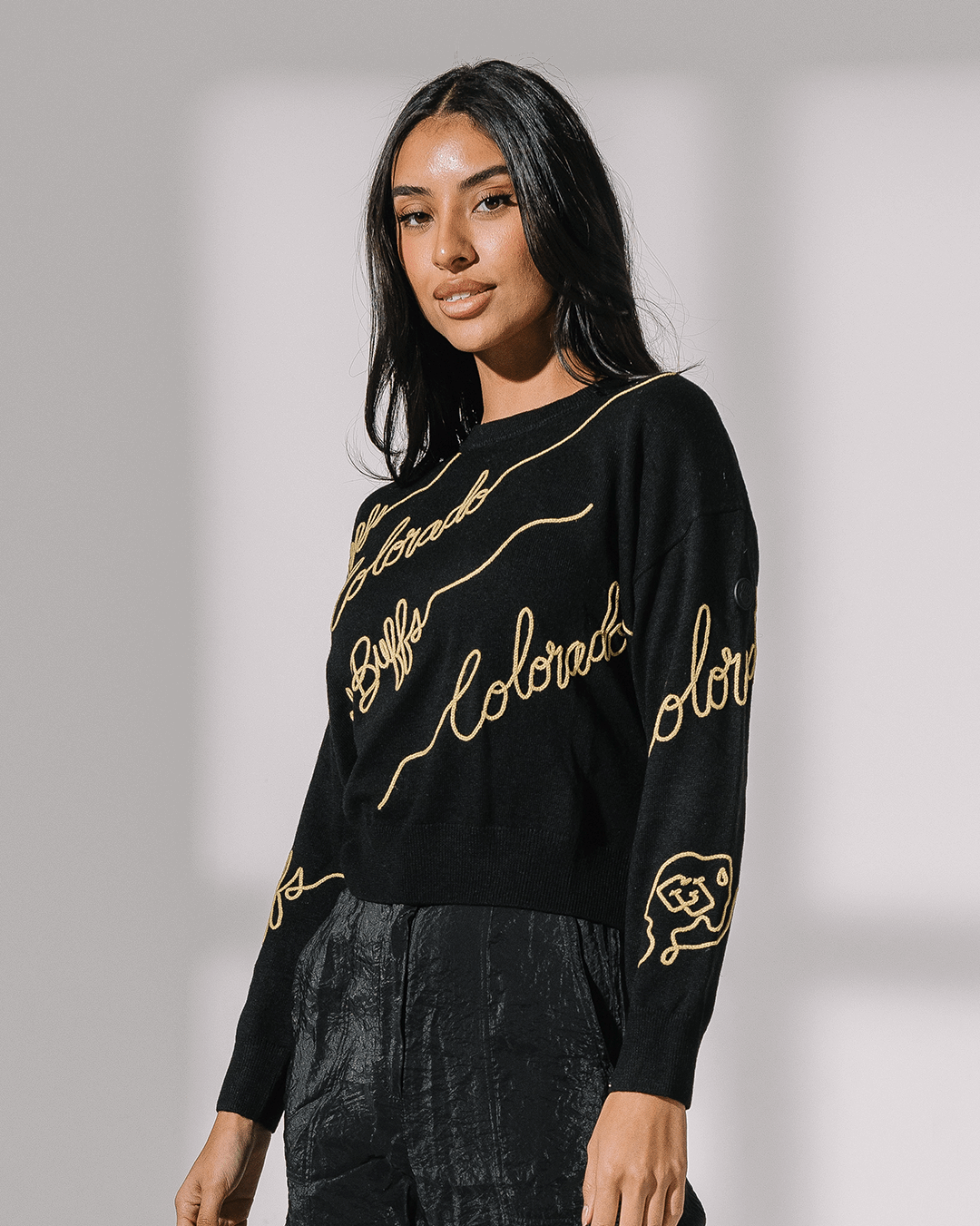 black long sleeve sweater with colorado buffaloes embroidery, perfect for college campus wear