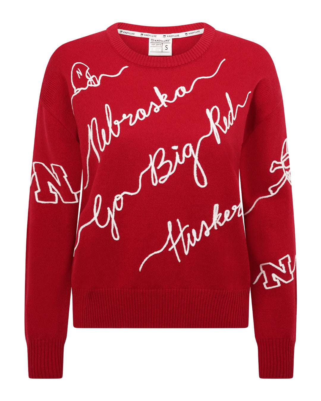 red crewneck sweater with nebraska cornhuskers embroidery, styled for college game day and tailgates