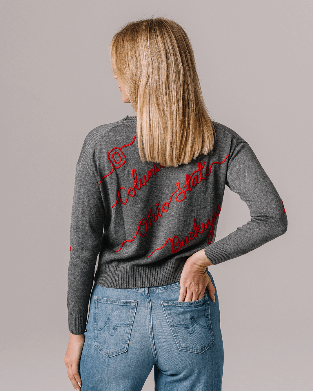 gray crewneck sweater with ohio state buckeyes embroidery, styled for college game day