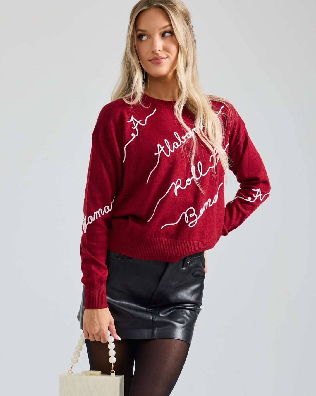 Red crewneck sweater with Alabama Crimson Tide embroidery perfect for spirited game day looks