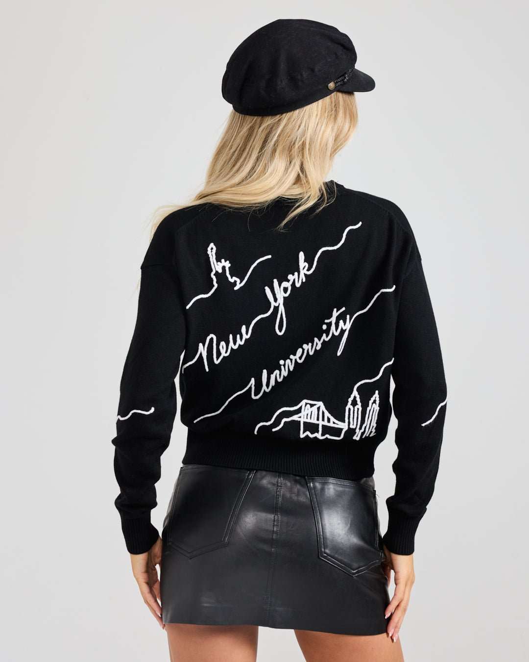 black long sleeve sweater with NYU violets embroidery, perfect for campus wear and walking to class