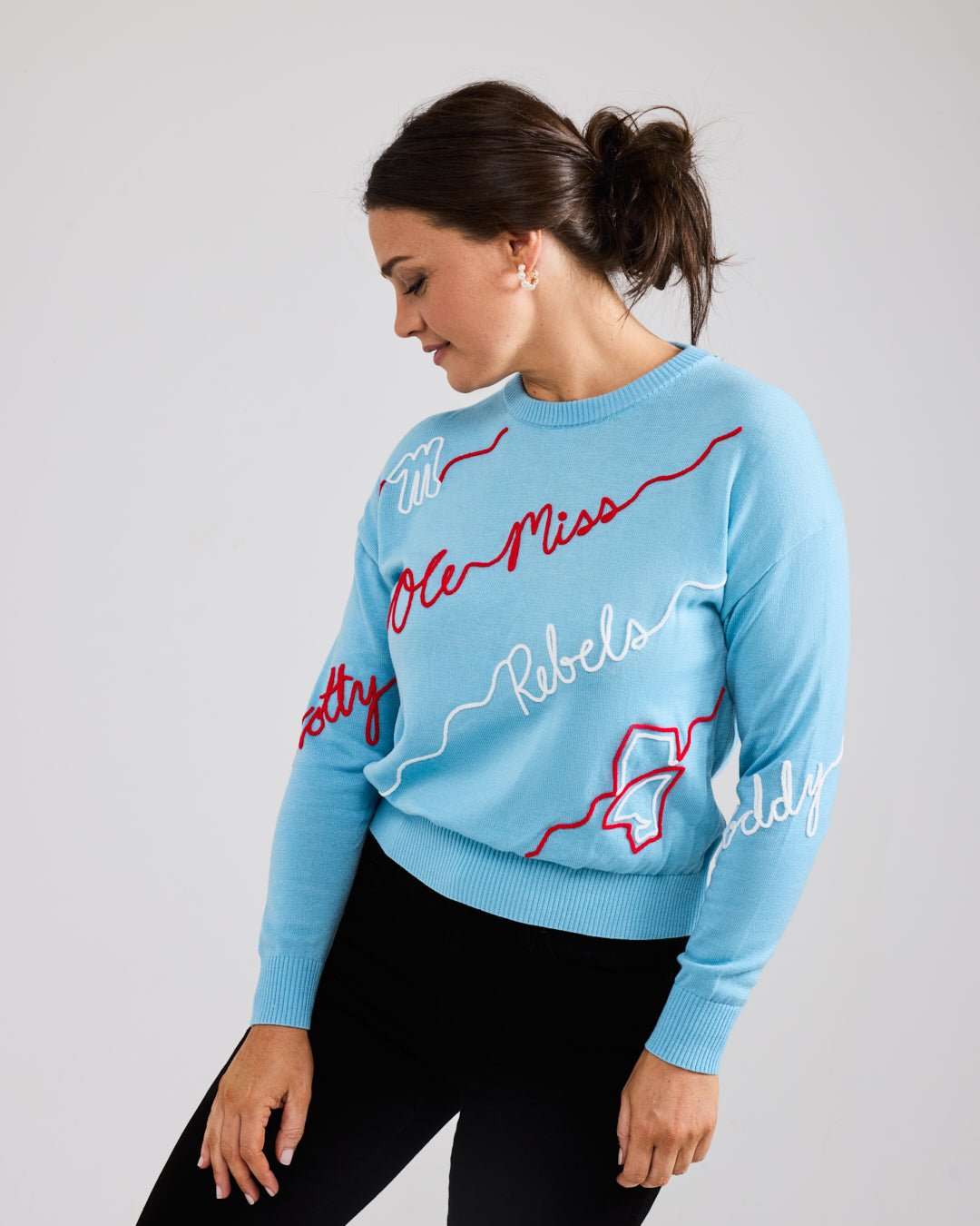 blue crewneck sweater with ole miss embroidery, perfect for college game day and tailgates.