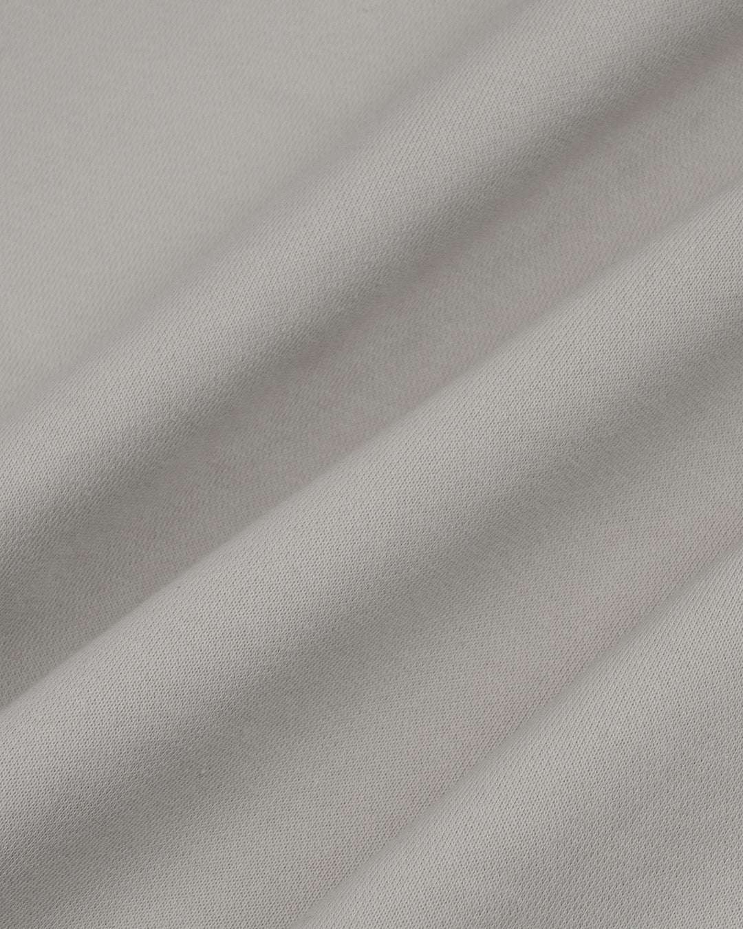 Soft beige oversized sweatshirt fabric, ideal for lounging or casual outings