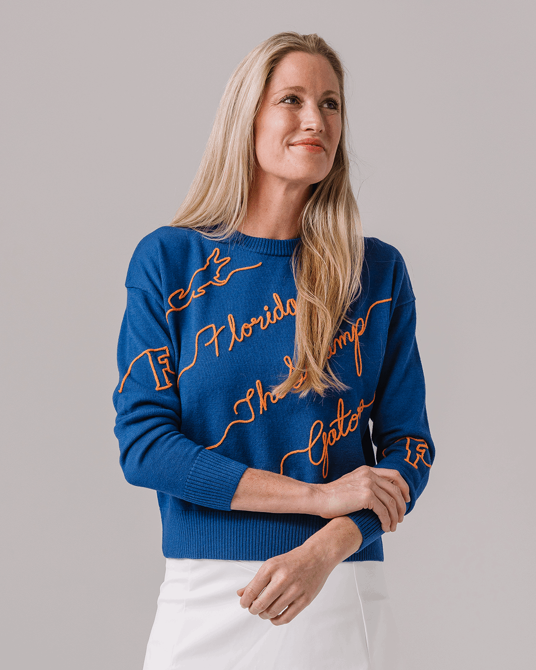 blue and orange NCAA crewneck sweater with Florida Gators embroidered logo, perfect for campus wear