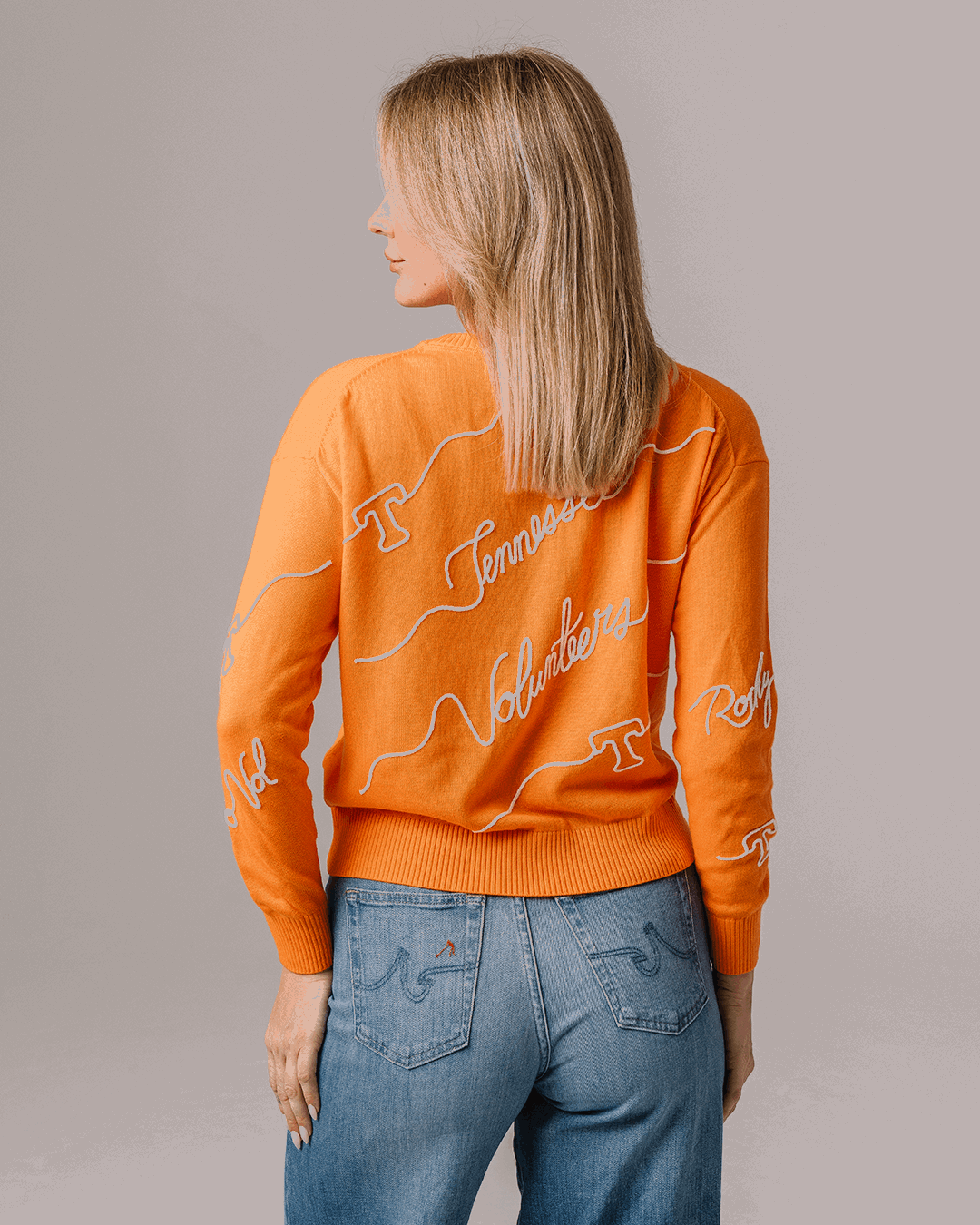 orange long sleeve sweater with tennessee volunteers embroidery, perfect for college tailgates