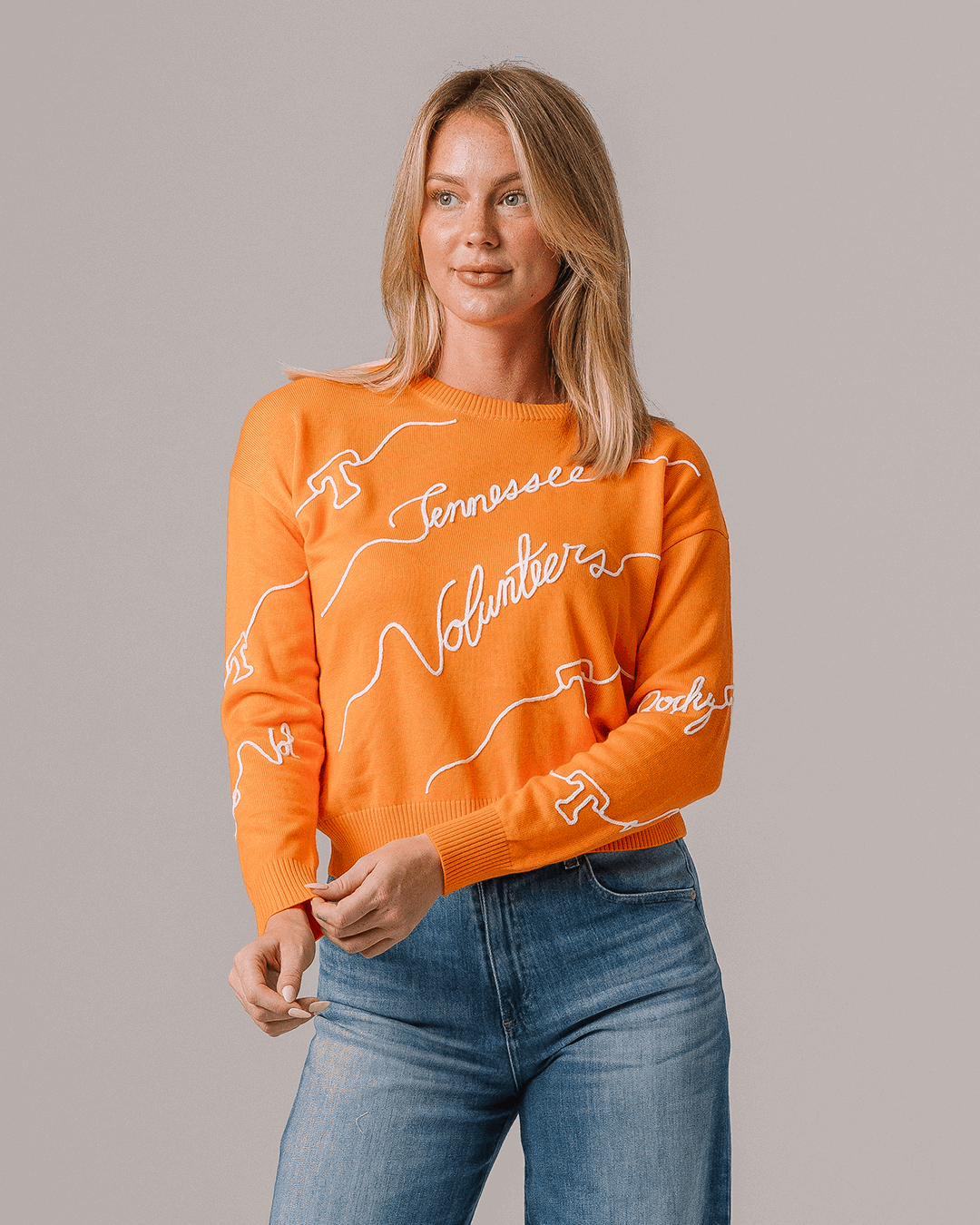 orange long sleeve sweater with tennessee volunteers embroidery, perfect for college tailgates