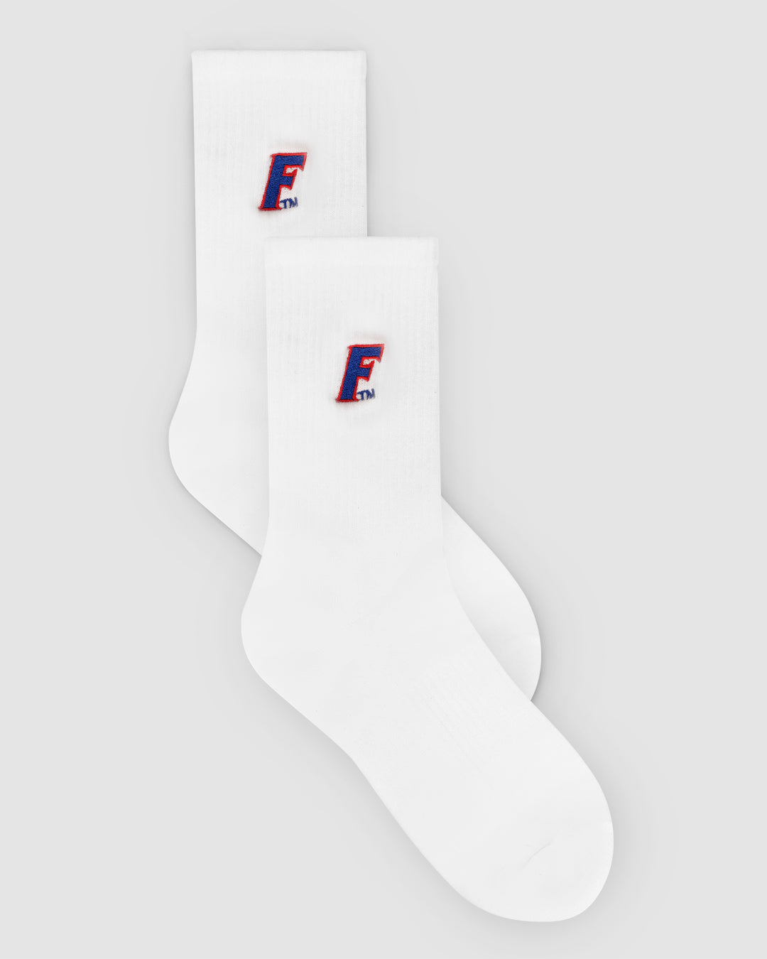 White crew sock with Florida Gators patch, perfect for campus and lounging