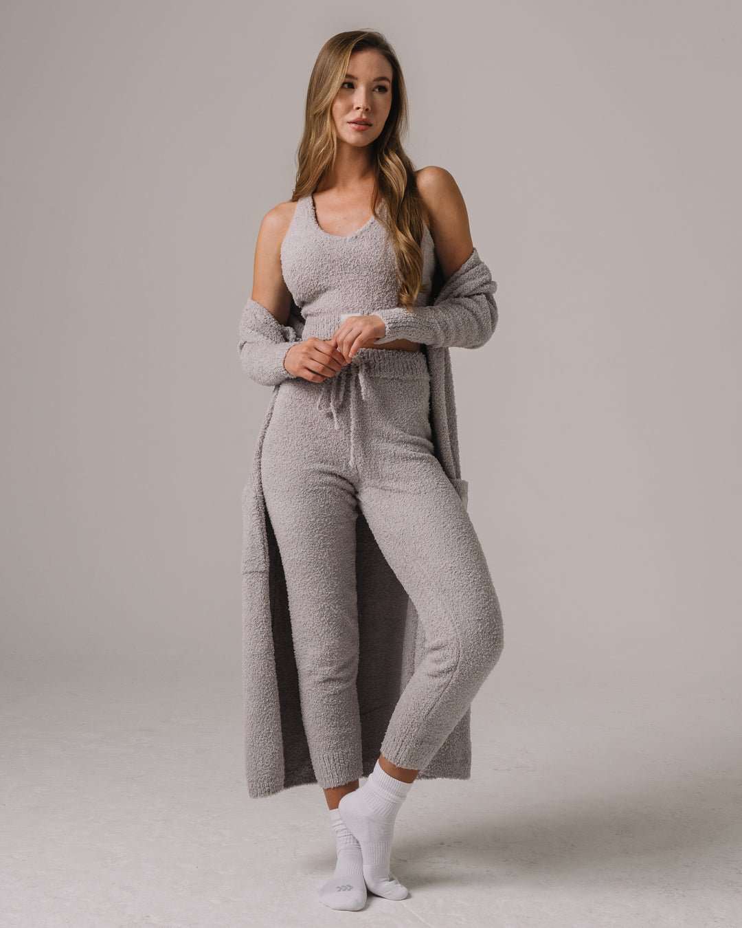 Gray fuzzy knit lounge set with Georgia Bulldogs patch, ultra-soft and perfect for relaxed game days.