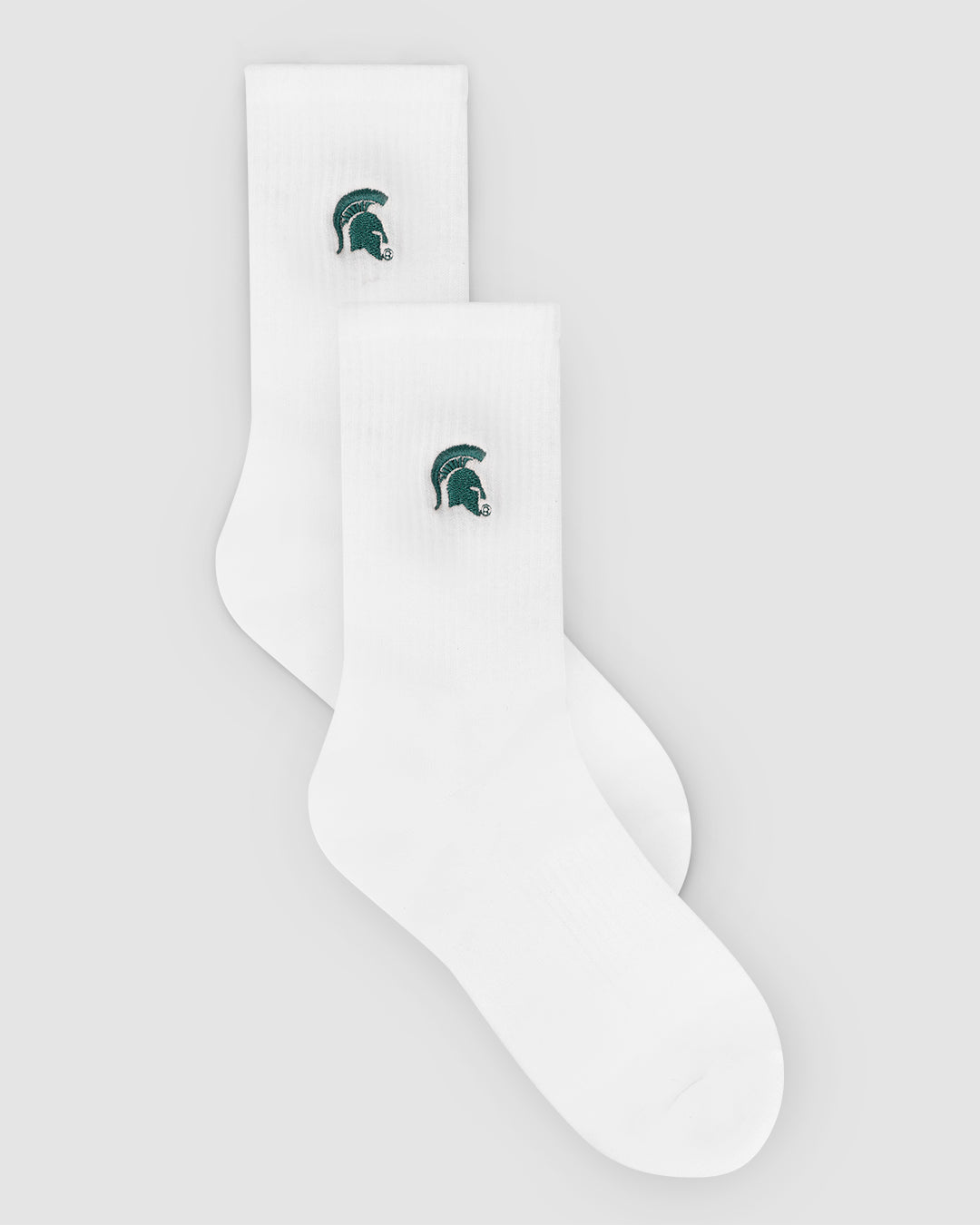 White crew sock with Michigan State Spartans patch, perfect for campus and lounging