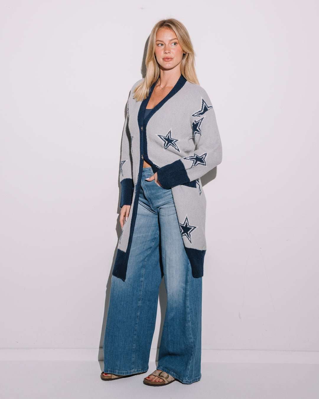 gray long sleeve cardigan with navy dallas cowboys star embroidery pattern, perfect for tailgates, game day, and lounging.