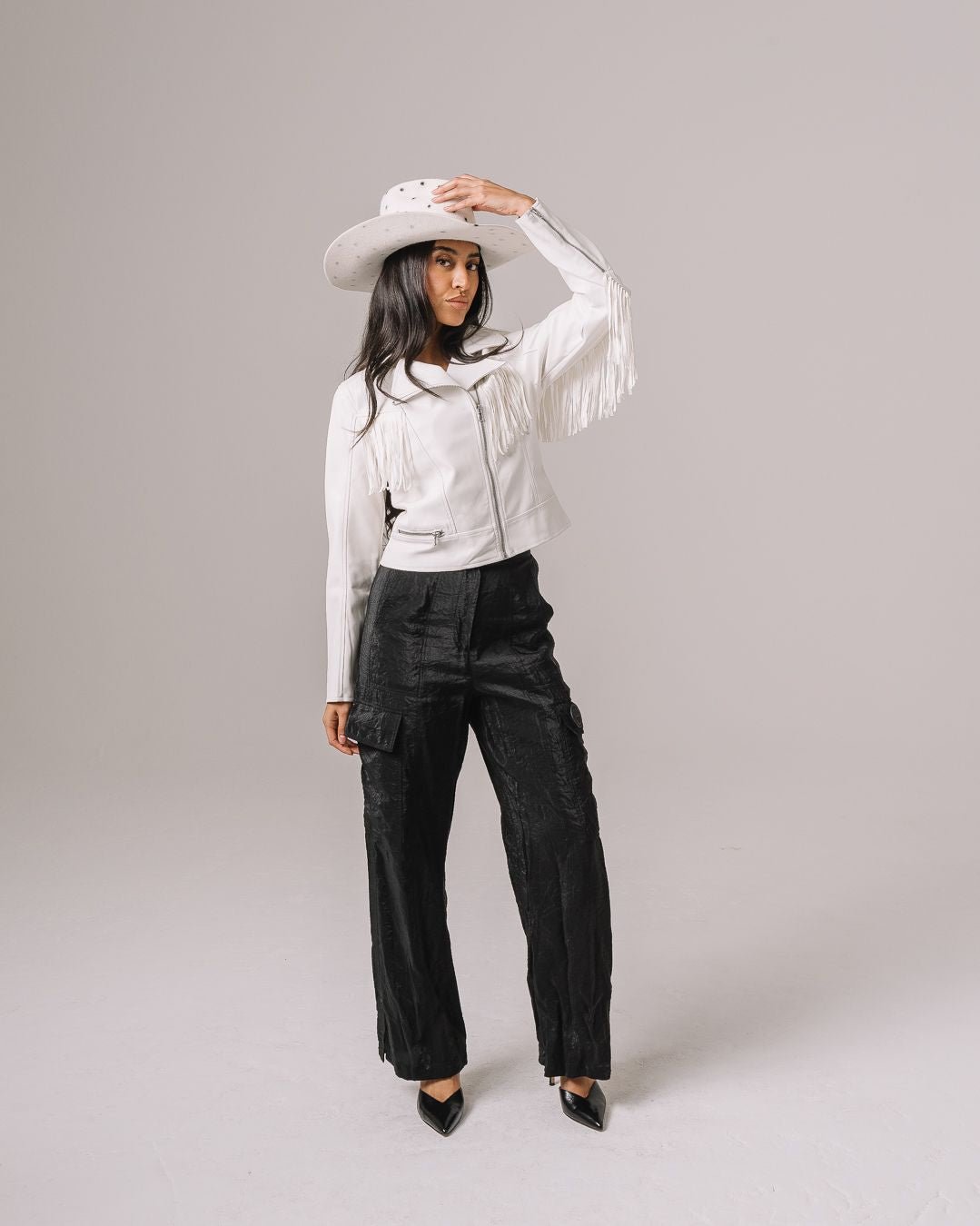 White fringe jacket with Dallas Cowboys star logo, perfect for game day, tailgates, or bold fan style.