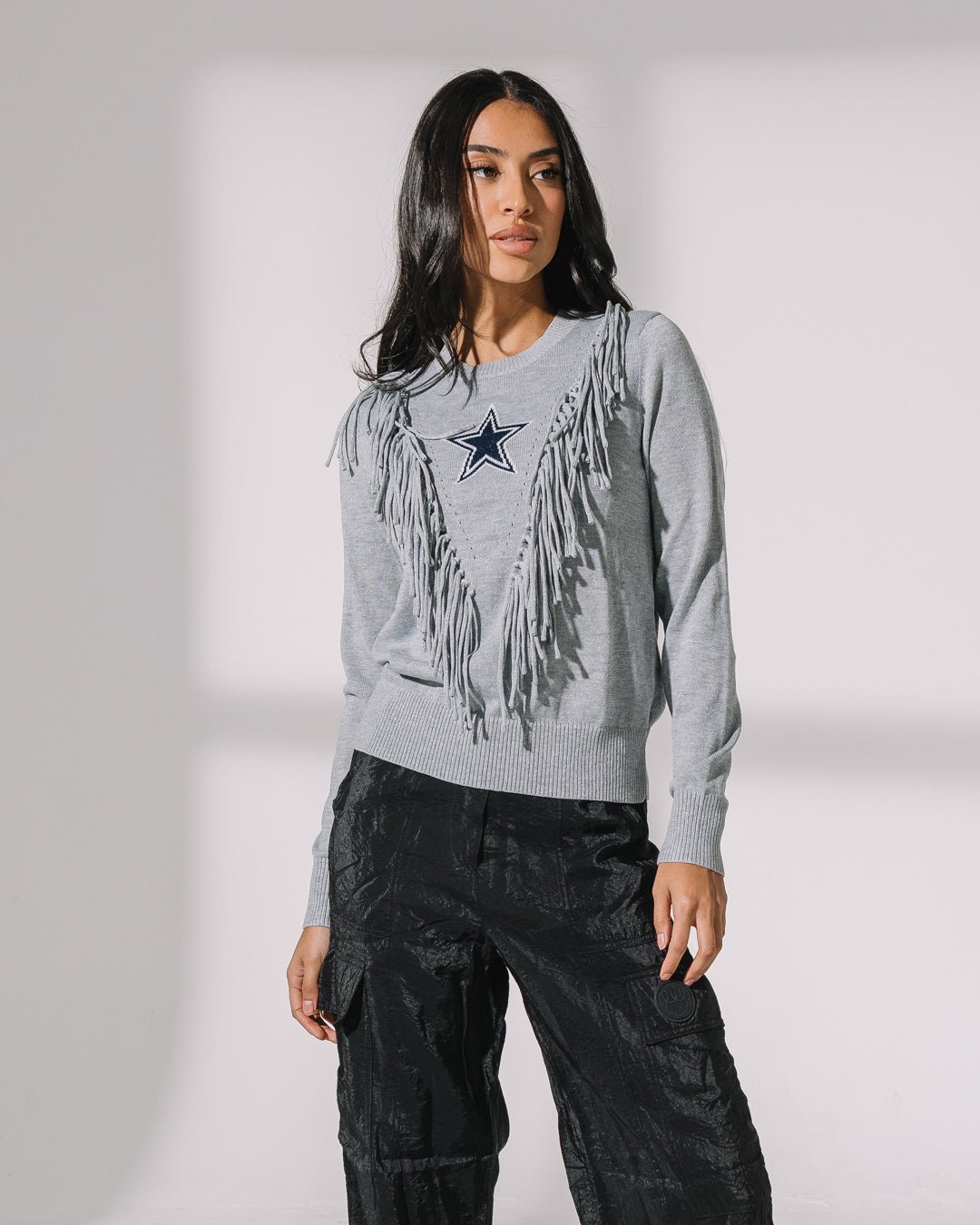 Silver fringe sparkle sweater with Dallas Cowboys star logo, perfect for game day or festive fan style.