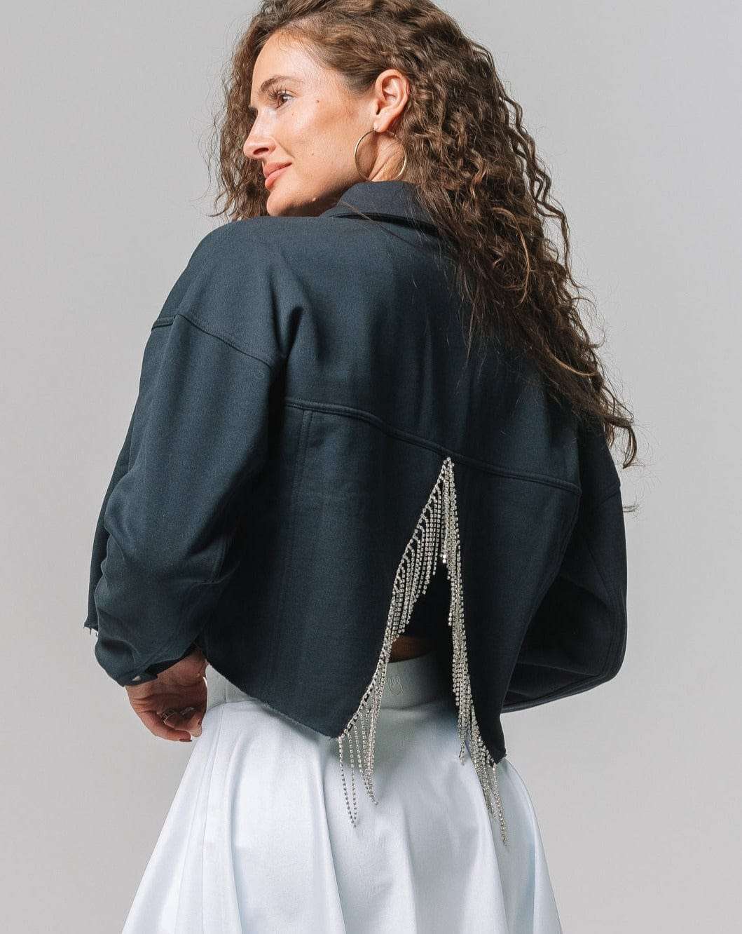 Navy rhinestone jacket with Dallas Cowboys logo, ideal for tailgates, city streets, or game day flair.