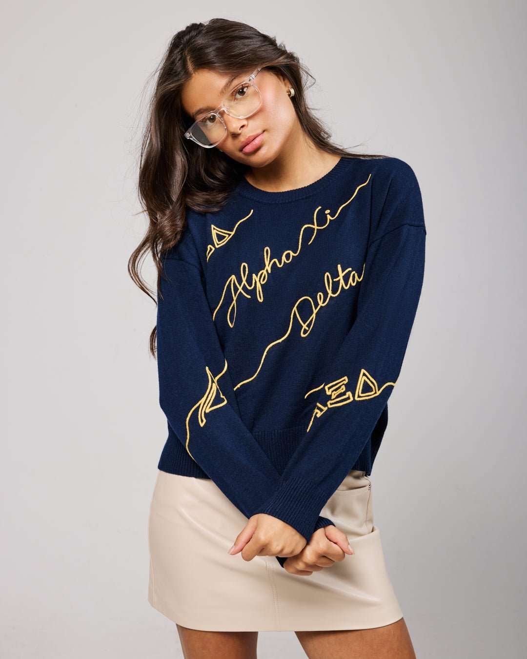 navy and gold long sleeve sorority sweater with Alpha Xi Delta embroidered logo, perfect for sorority alumni events