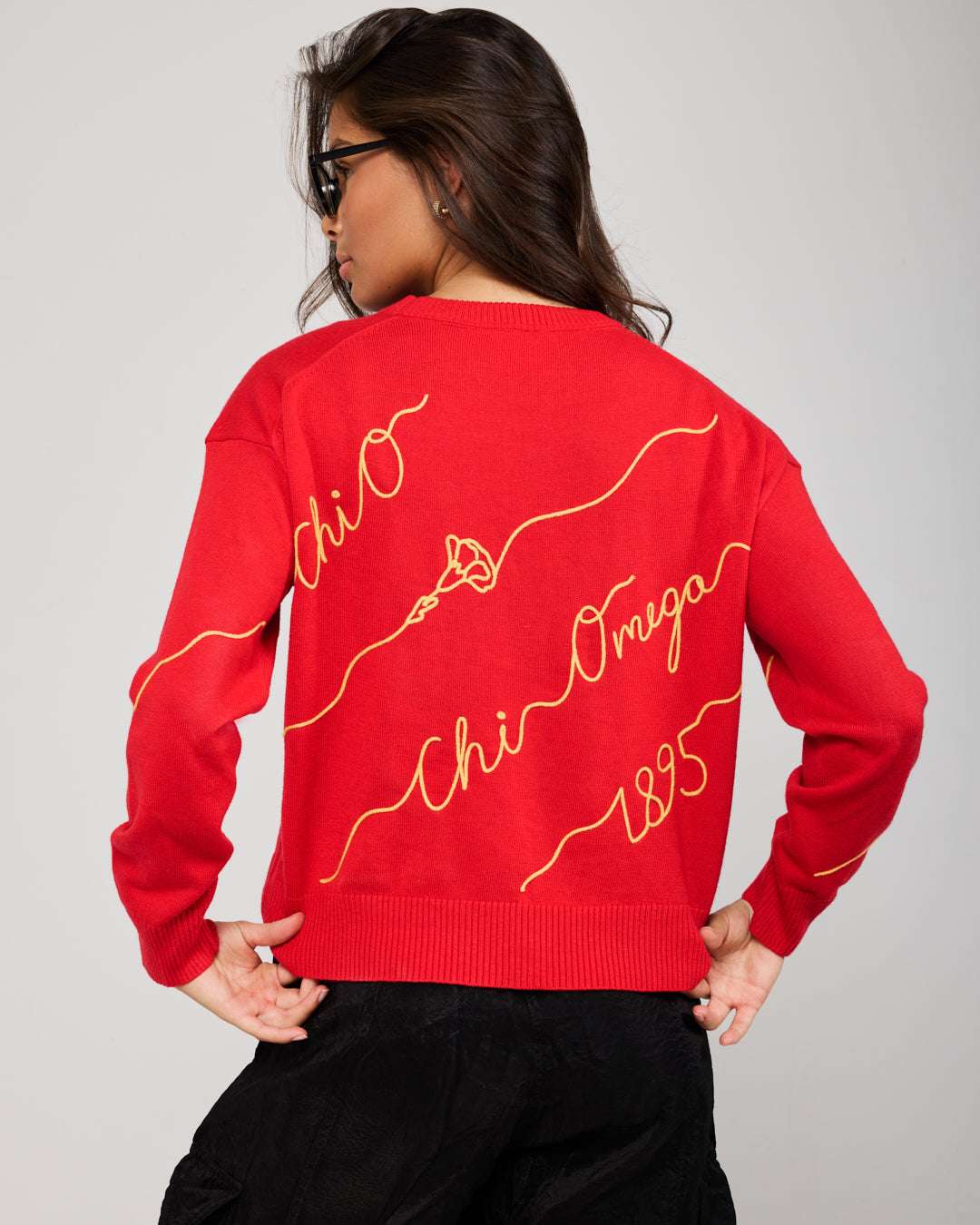 red and gold long sleeve sorority sweater with Chi Omega embroidered logo, perfect for sorority sisterhood events