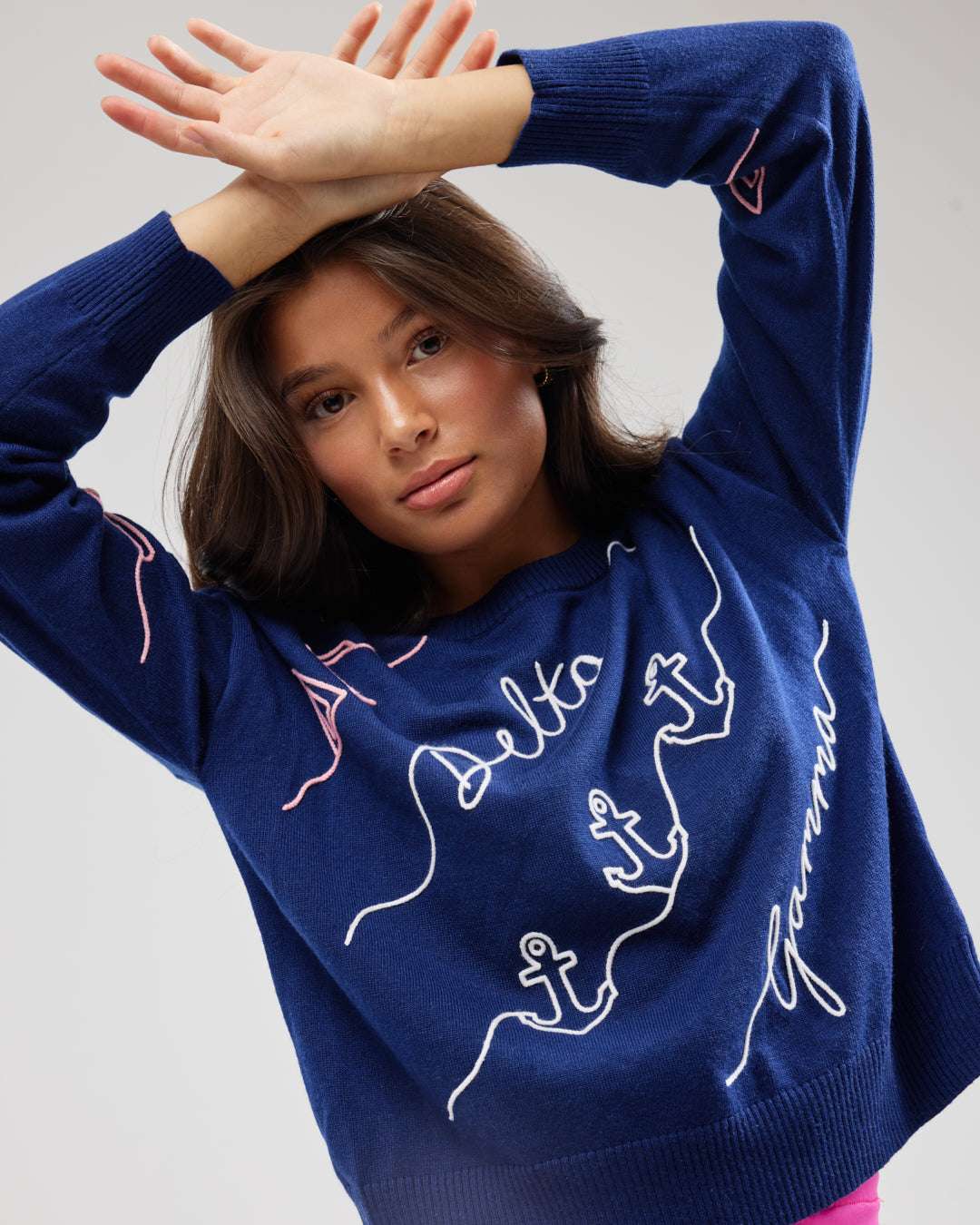 navy and pink crewneck sorority sweater with Delta Gamma embroidered logo, perfect for sorority chapter meetings