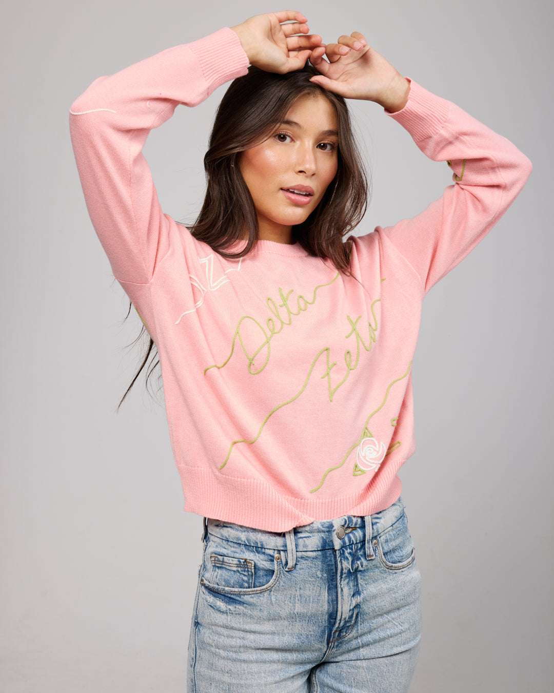 pink and gold crewneck sorority sweater with Delta Zeta embroidered logo, perfect for sorority rush outfits