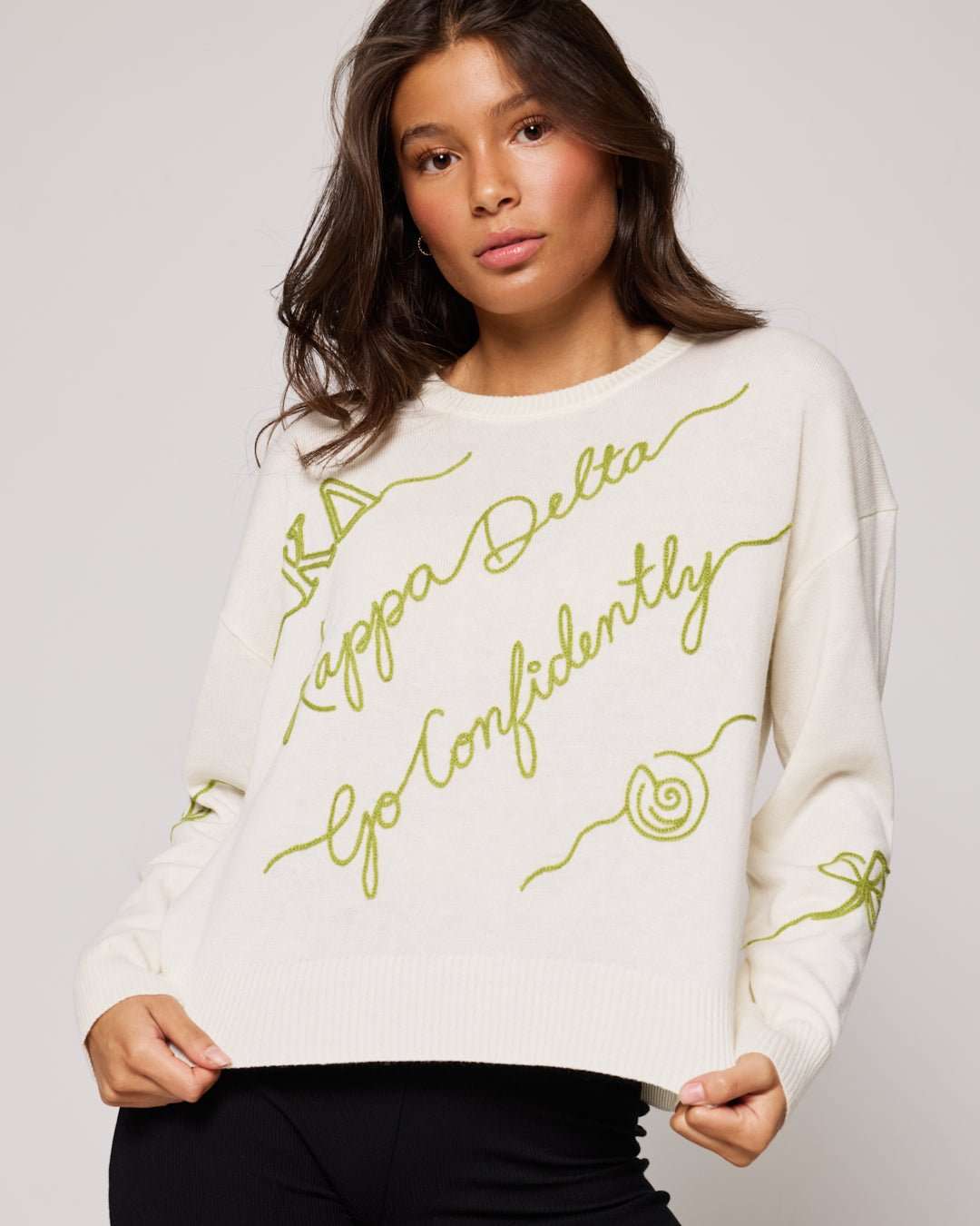 white and gold long sleeve sorority sweater with Kappa Delta embroidered logo, perfect for sorority themed gatherings