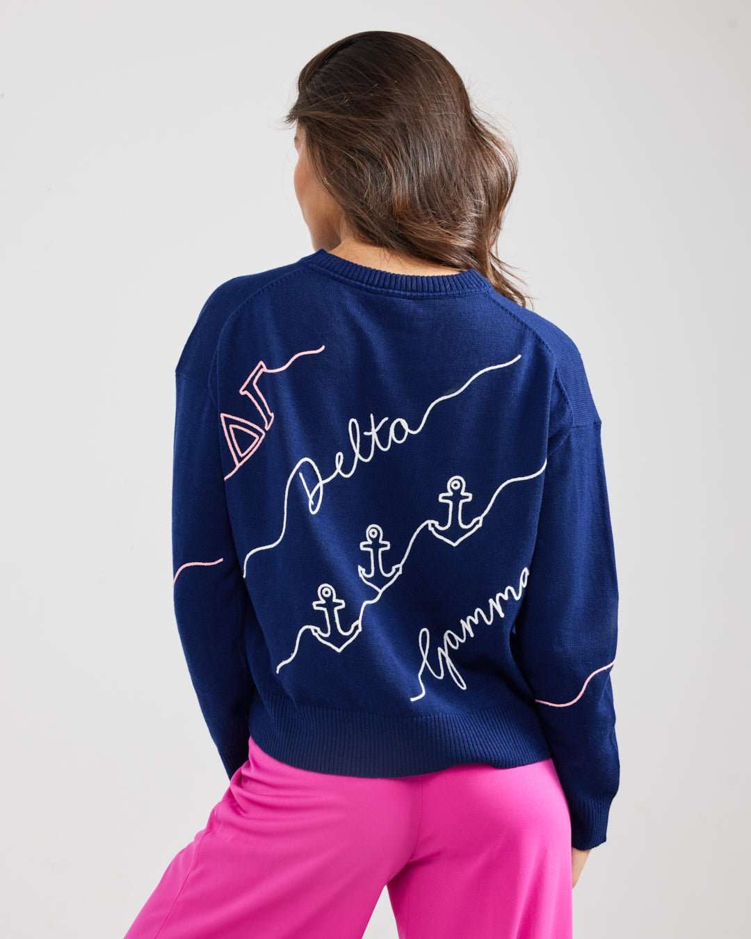 navy and pink crewneck sorority sweater with Delta Gamma embroidered logo, perfect for sorority chapter meetings