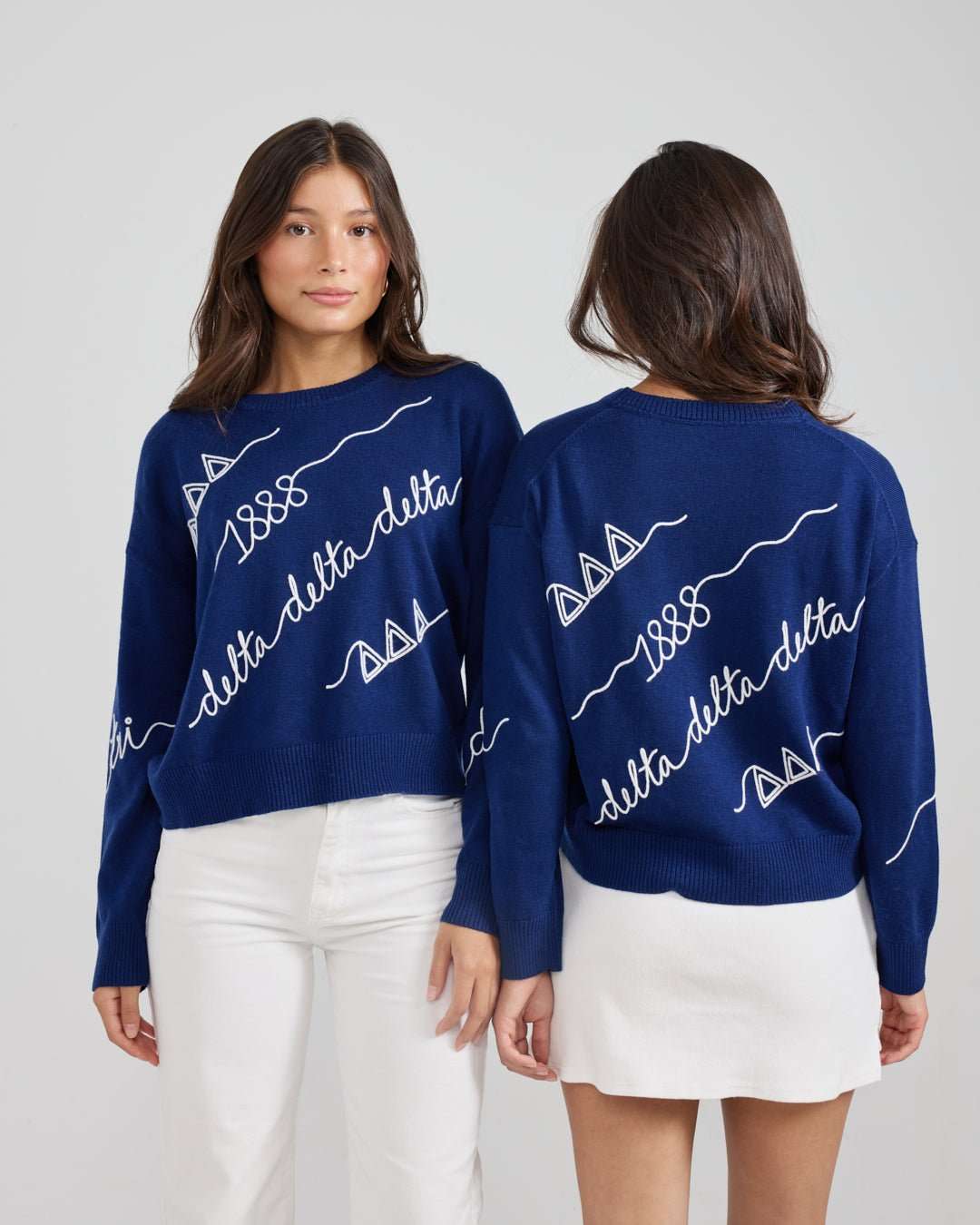 blue and white long sleeve sorority sweater with Tri Delta embroidered logo, perfect for sorority alumni tailgate
