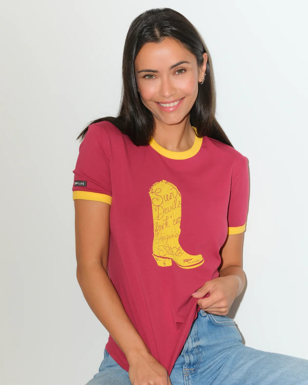 Maroon Arizona State Sun Devils women's ringer tee with gold trim and a bold gold cowboy boot graphic on the chest.