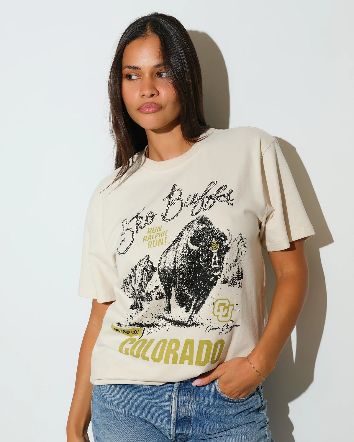 Bone oversized tee featuring a vintage-style Colorado Buffaloes graphic with a buffalo illustration and "Sko Buffs" script on the front.