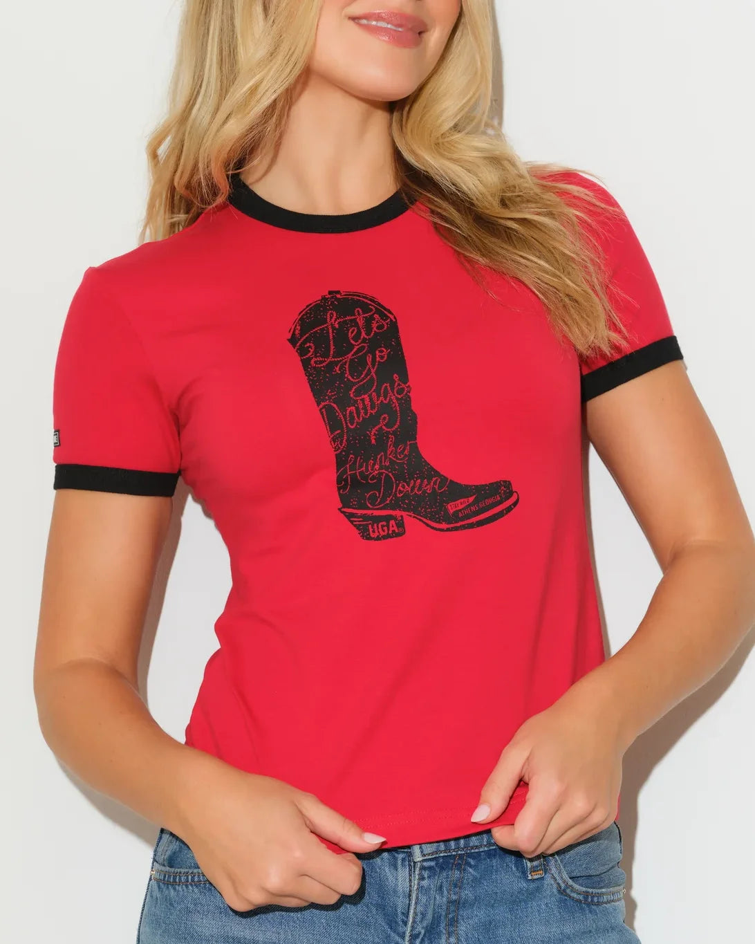 Red Georgia Bulldogs women's ringer tee with black trim and a cowboy boot graphic on the chest.