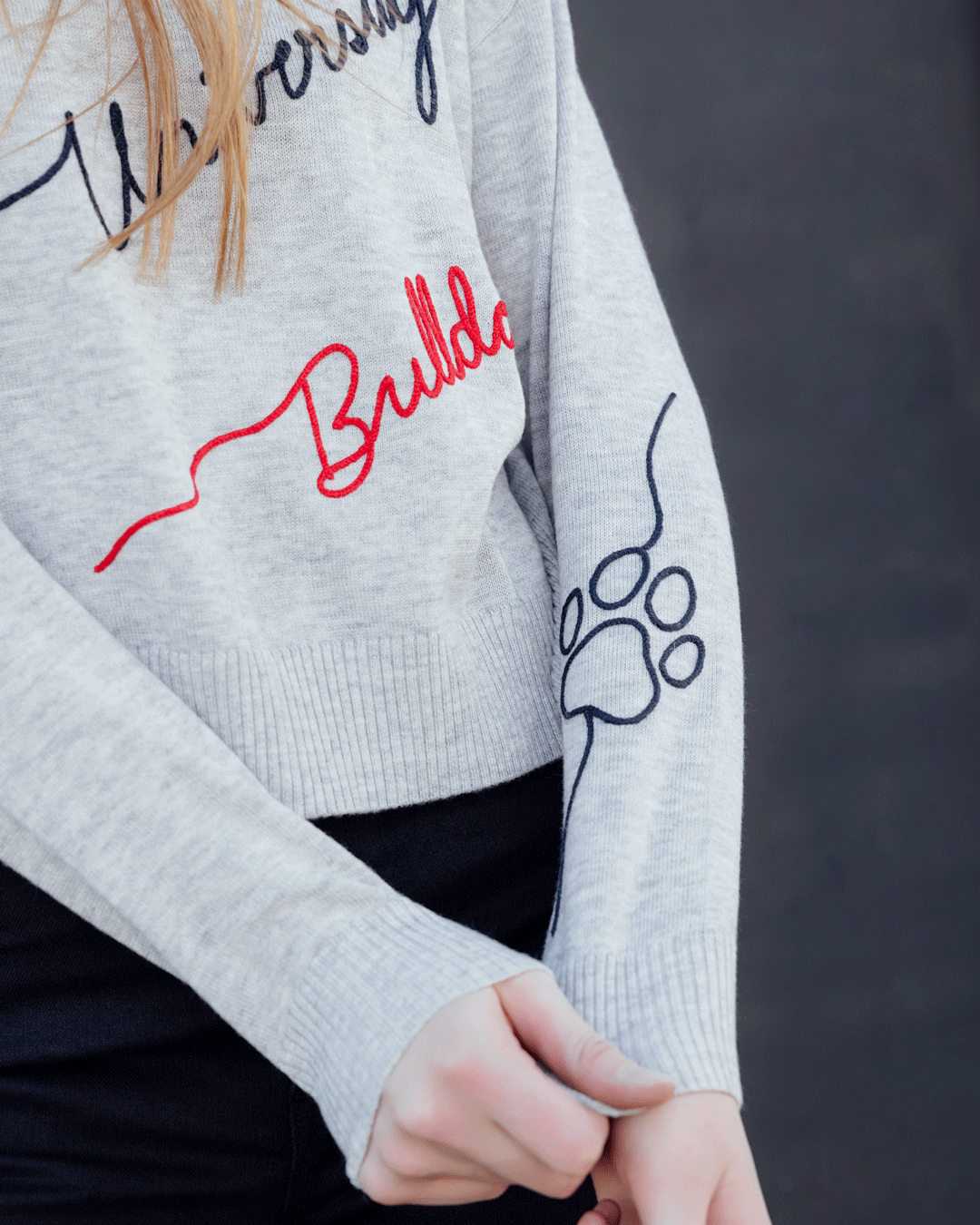 gray long sleeve sweater with gonzaga university bulldogs theme, styled for march madness, alumni, and campus wear.