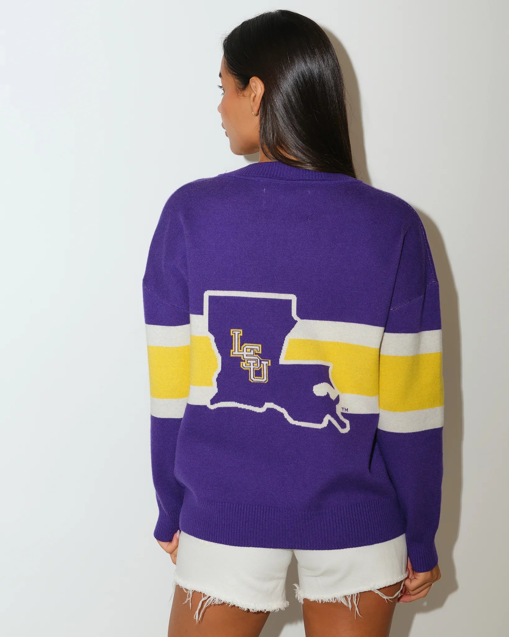 Purple LSU Tigers Vinti cardigan sweater with Louisiana state outline graphic and gold and white stripe detailing across the back.