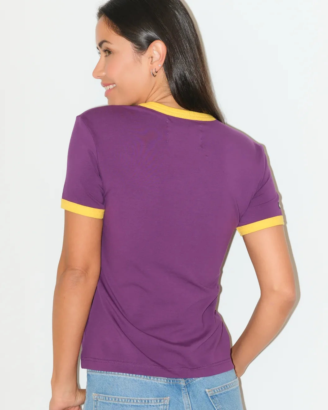 Purple LSU Tigers women's ringer tee with gold trim and a large embroidered-style gold cowboy boot graphic on the chest.