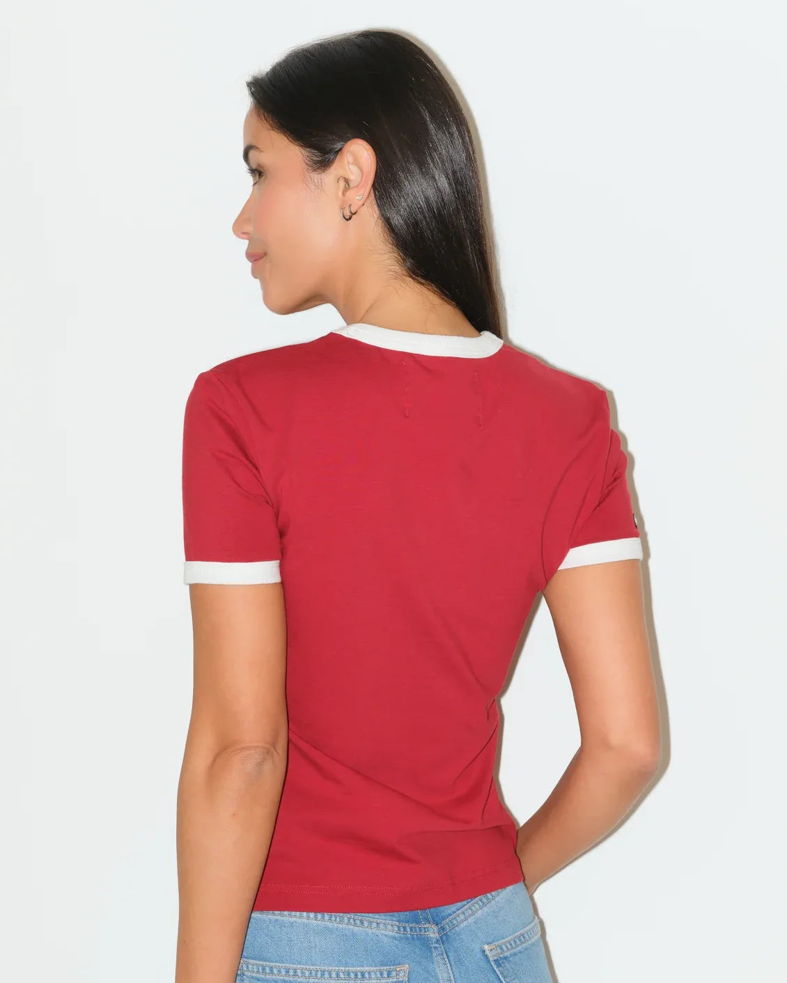 Crimson and white Oklahoma Sooners ringer tee featuring a bold red cowboy boot graphic on the chest.