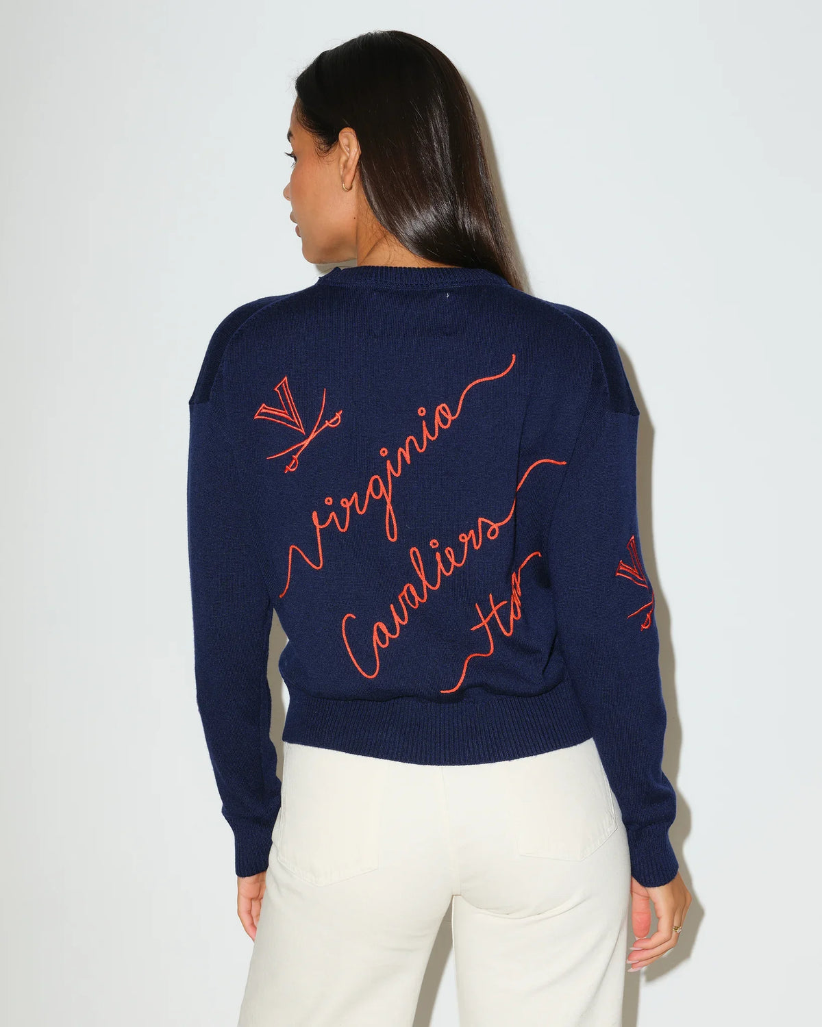 Navy Virginia Cavaliers crewneck sweater featuring red cursive "Virginia Cavaliers" script and logo details throughout.
