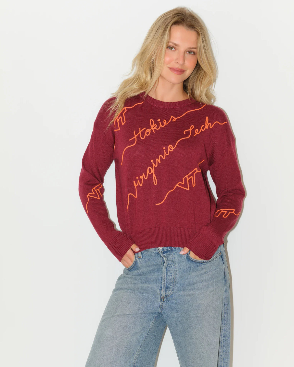 Maroon Virginia Tech crewneck sweater with diagonal orange script "Hokies," "Virginia Tech," and "VT" lettering across the front.