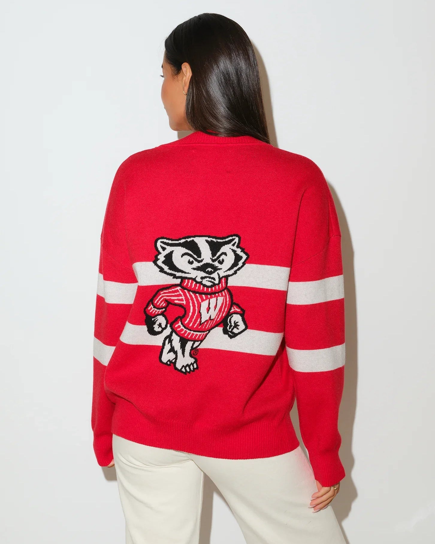 Red Wisconsin Badgers Vinti cardigan with white chest stripes, V-neck, button front, and embroidered "W" logo on the left chest.