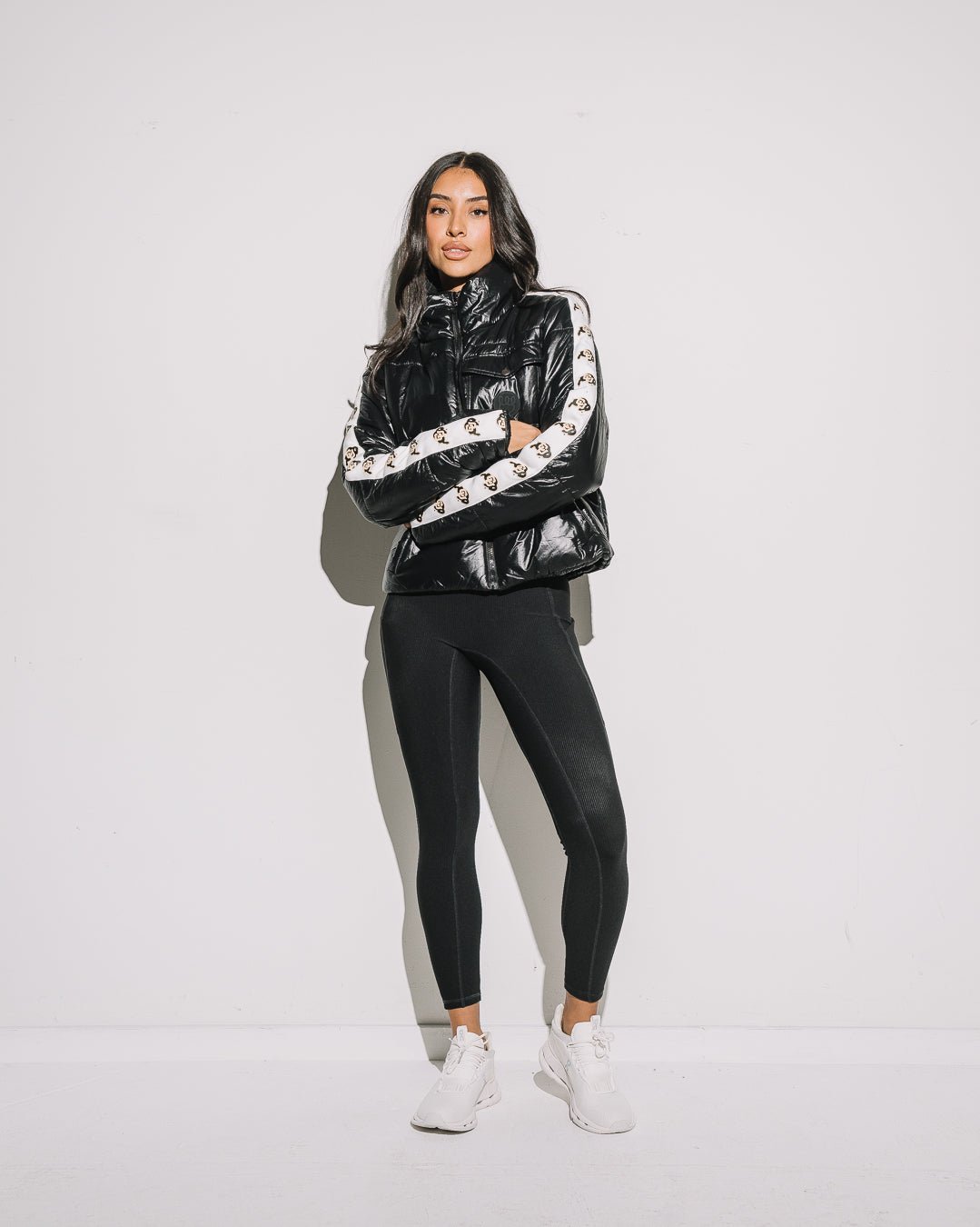 Black cargo puffer jacket with Colorado Buffaloes arm tape logo, warm and perfect for game day or outdoor wear.