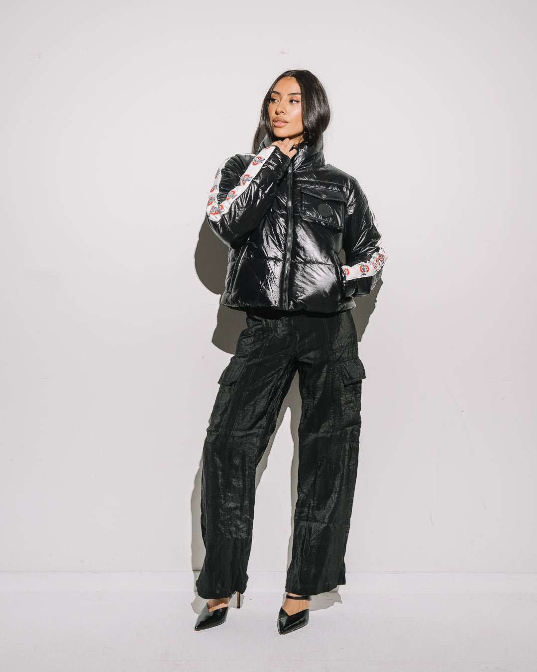 Black cargo puffer jacket with Ohio State Buckeyes logo, warm and perfect for game day or tailgate season