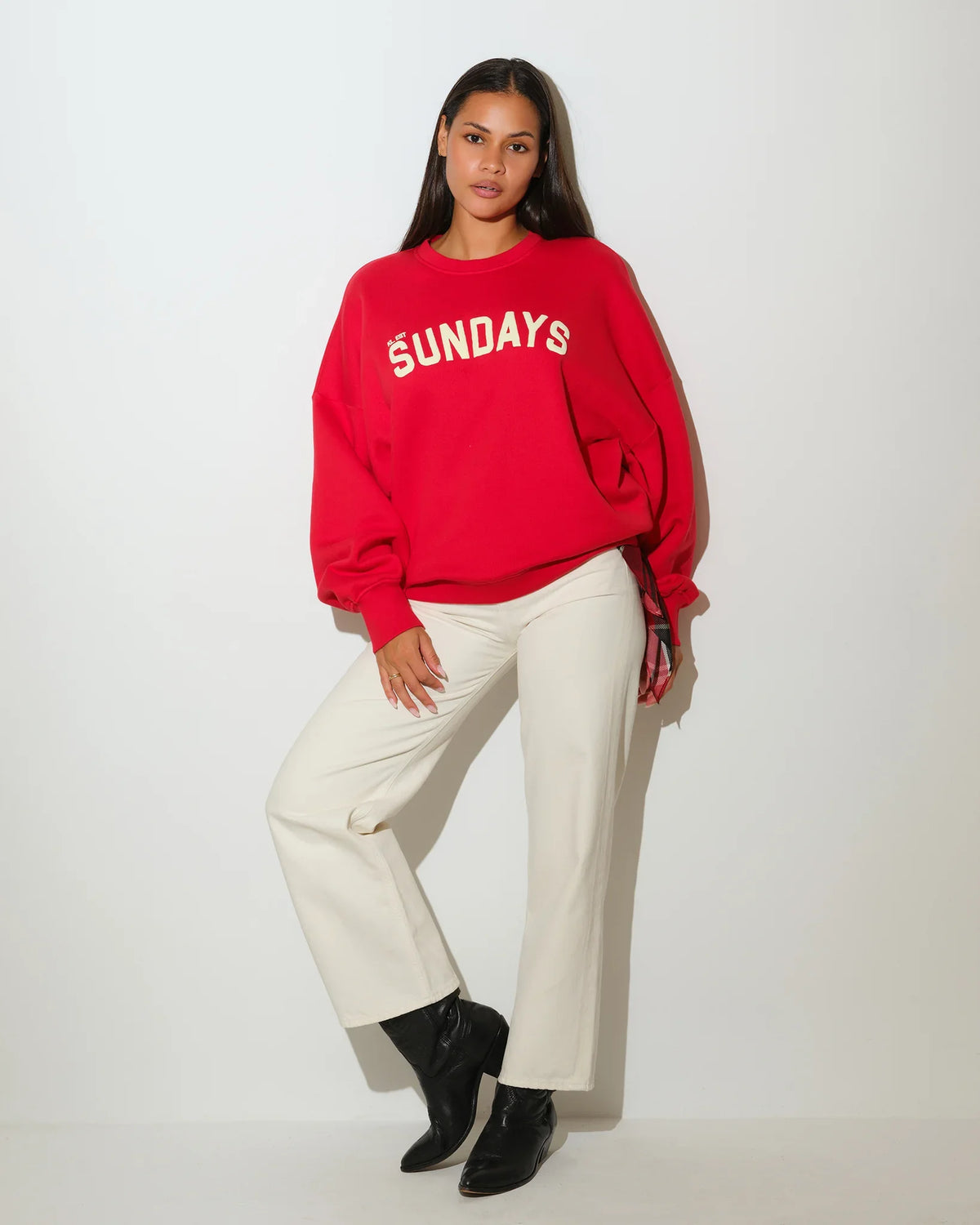 Red KadyLuxe Balloon Sleeve Crew sweatshirt with "SUNDAYS" graphic lettering across the chest, featuring a relaxed fit and crew neckline.