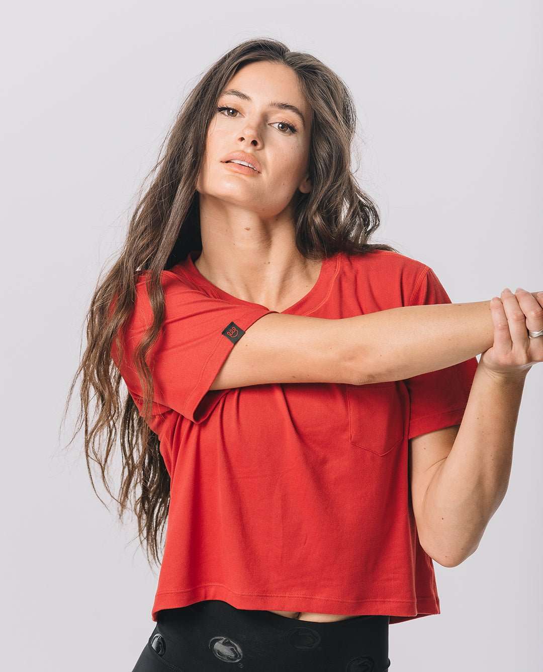 Front view of KADYLUXE® Milky Silk™ Crop Tee in Cardinal