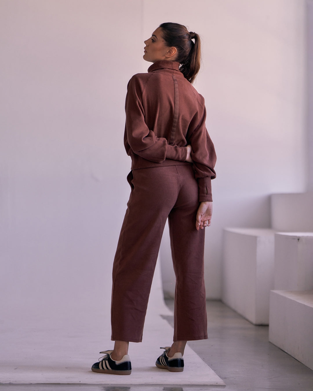 KADYLUXE® womens corduroy lounge set including a turtkleneck and wide leg pant in color brown.