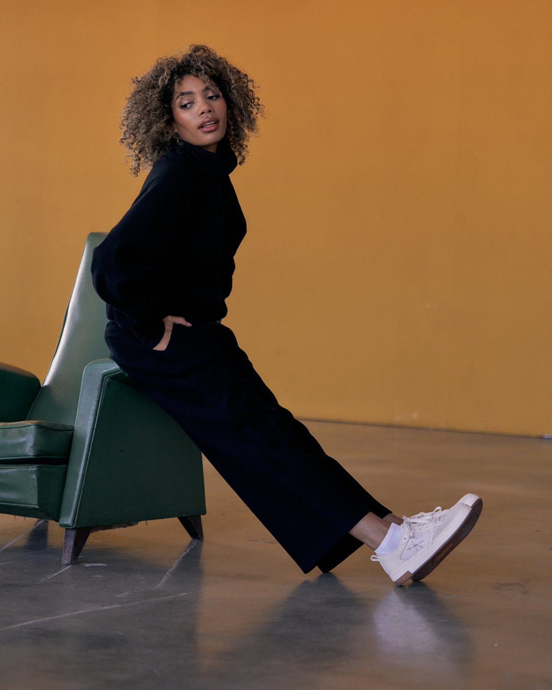 Side view of KADYLUXE® Corduroy Wide Leg Pant in Black