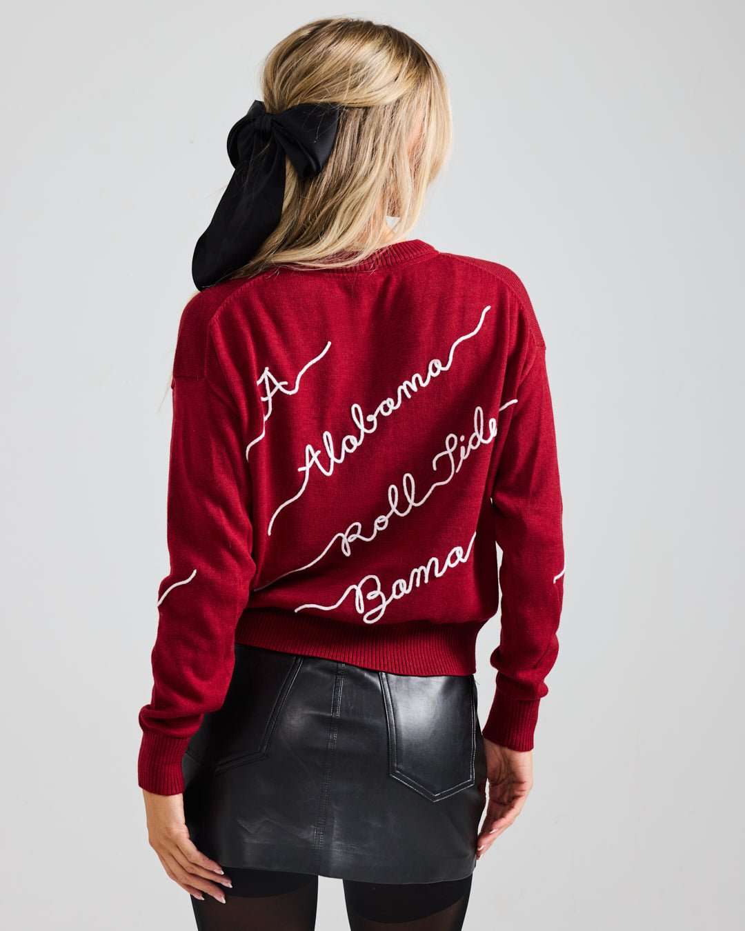 Red crewneck sweater with Alabama Crimson Tide embroidery perfect for spirited game day looks