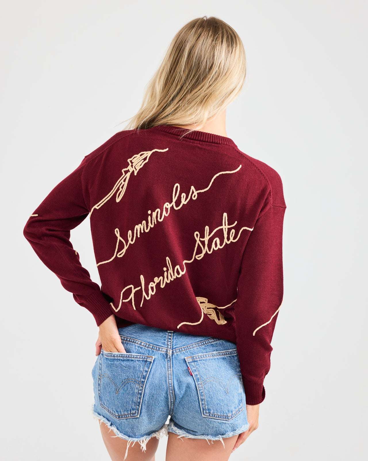 maroon crewneck sweater with florida state seminoles embroidery, styled for college tailgates