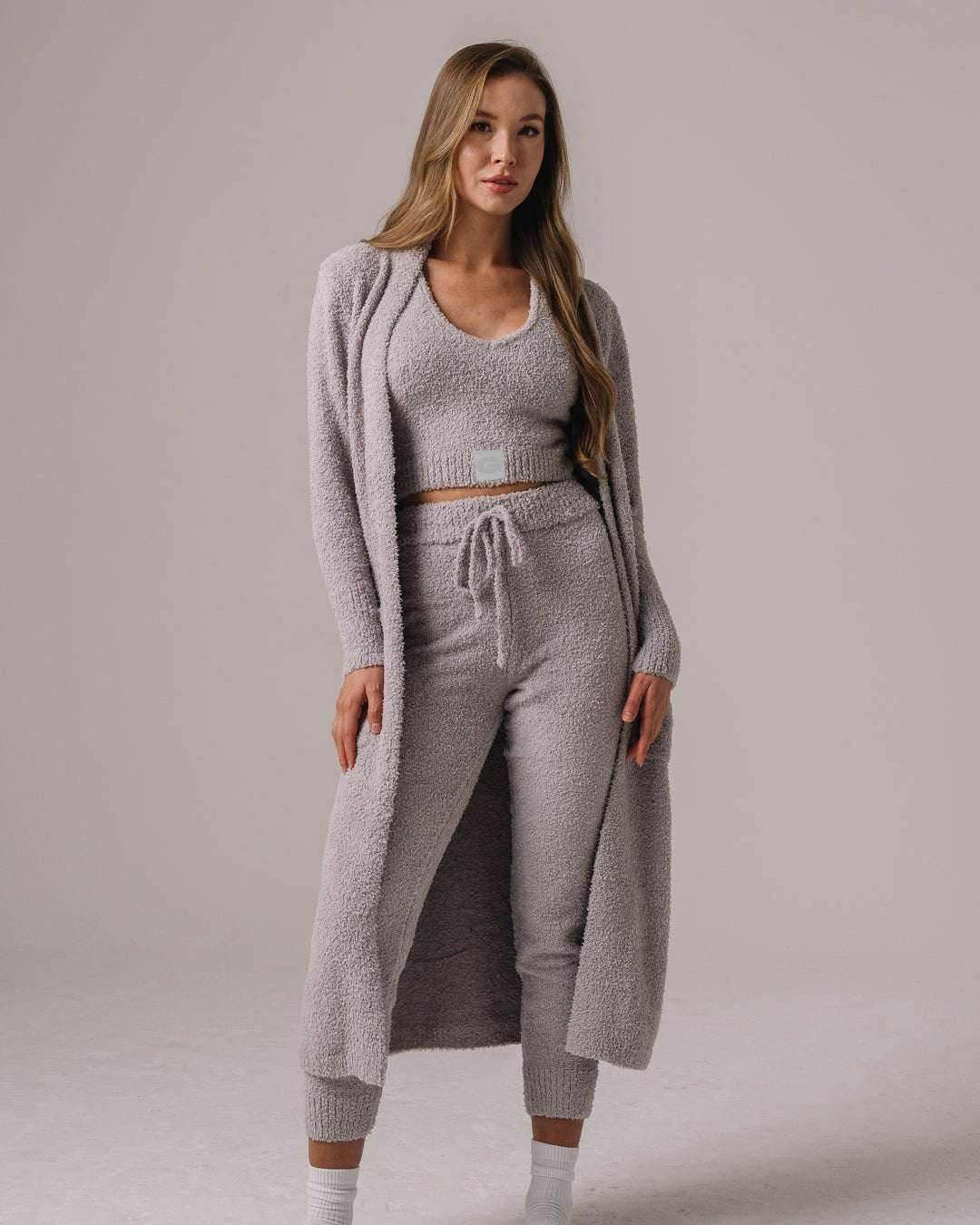 Gray fuzzy knit lounge set with Georgia Bulldogs patch, ultra-soft and perfect for relaxed game days.