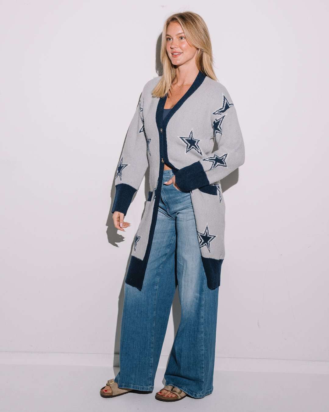 gray long sleeve cardigan with navy dallas cowboys star embroidery pattern, perfect for tailgates, game day, and lounging.