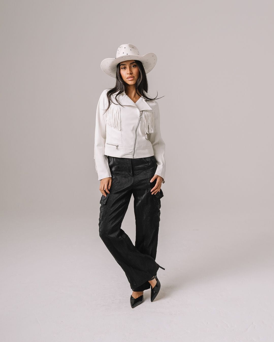 White fringe jacket with Dallas Cowboys star logo, perfect for game day, tailgates, or bold fan style.