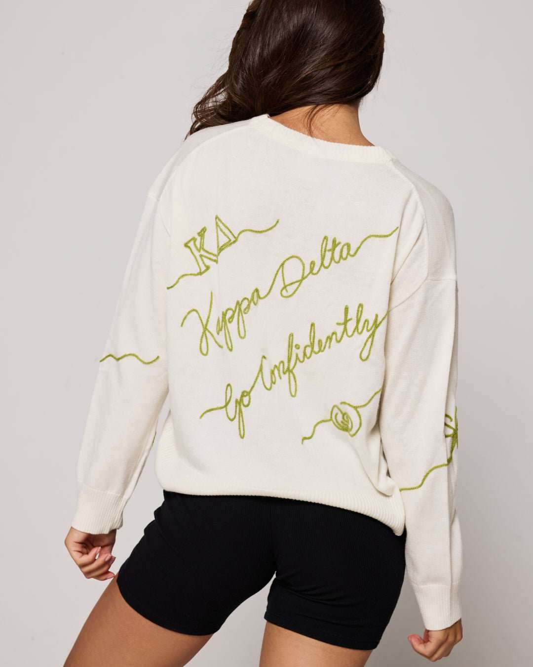white and gold long sleeve sorority sweater with Kappa Delta embroidered logo, perfect for sorority themed gatherings