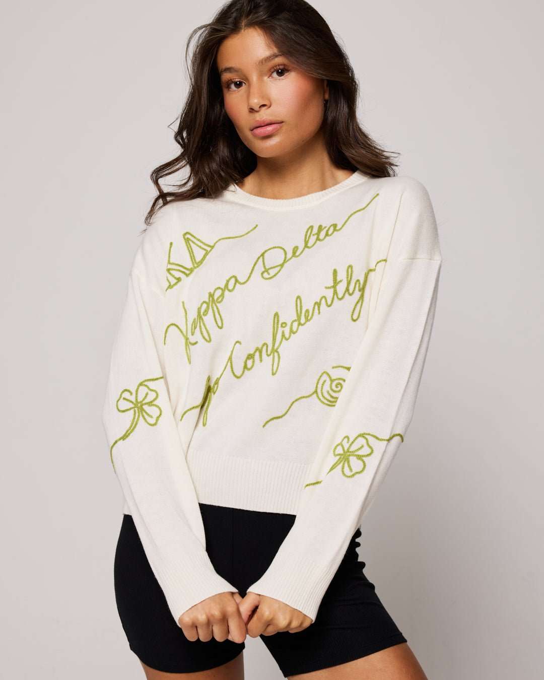 white and gold long sleeve sorority sweater with Kappa Delta embroidered logo, perfect for sorority themed gatherings